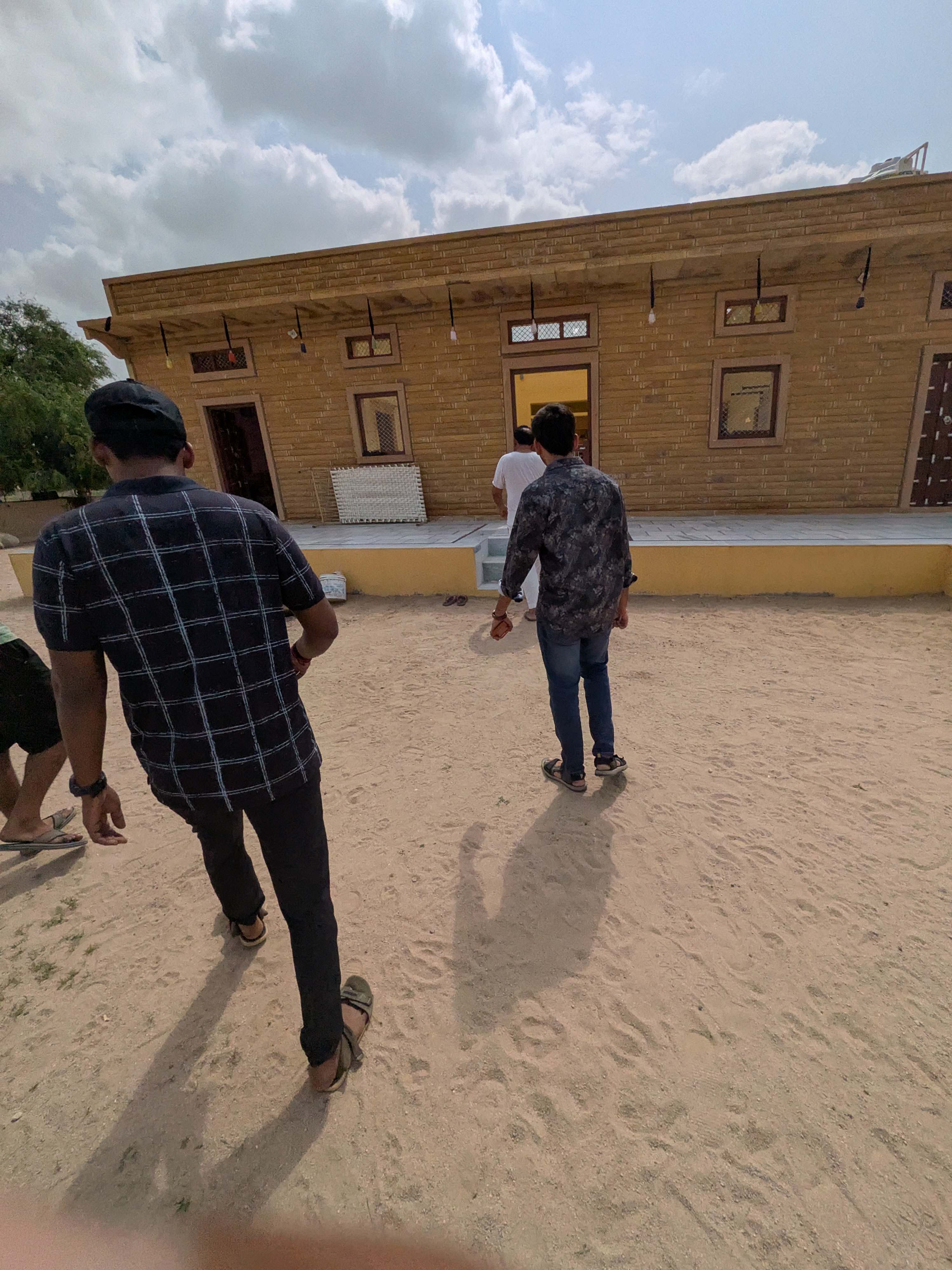 Village house entry — one of the unexpected stops on the route